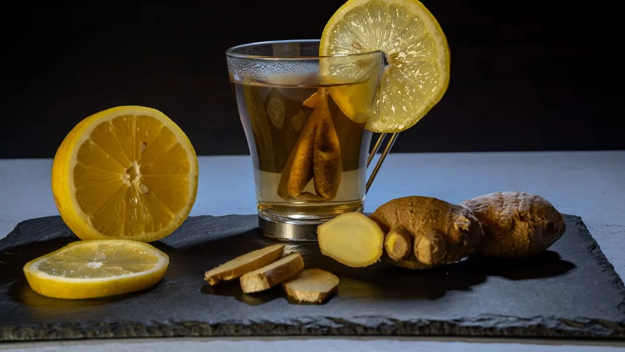 A refreshing ginger lemon tea with fresh lemon and ginger slices, perfect for immune support.