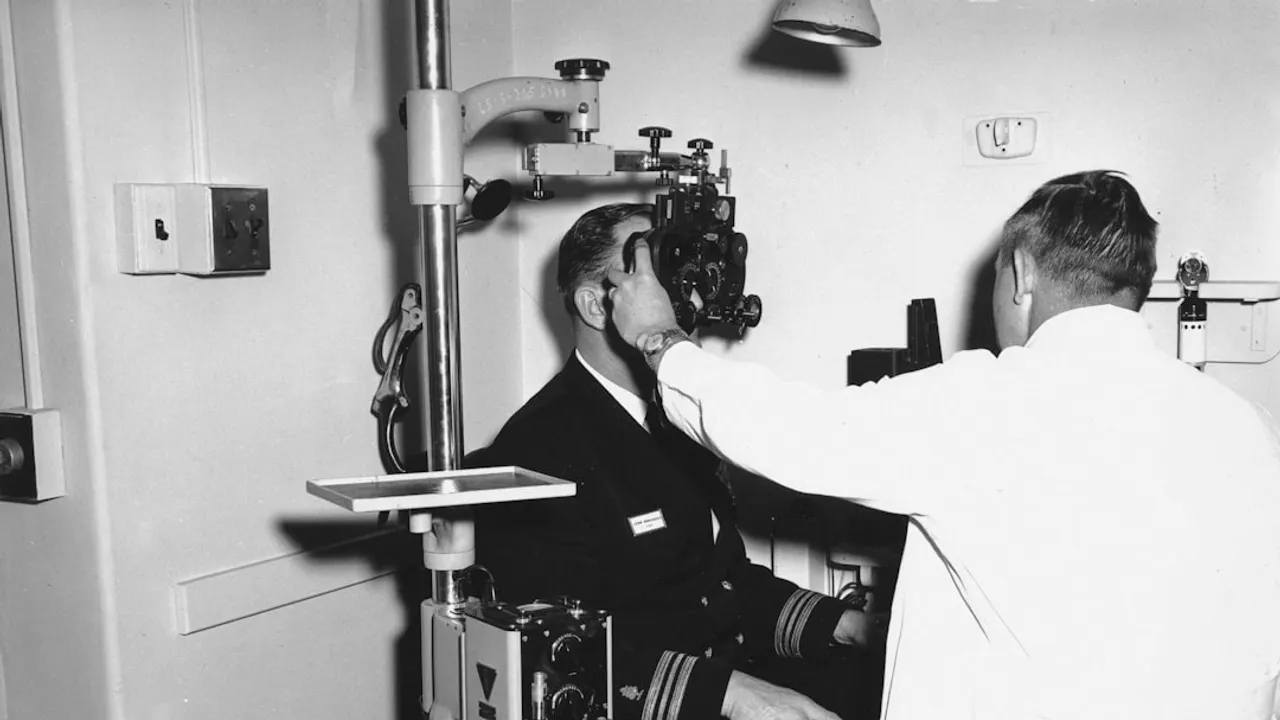 Doctor examining patient's eyes with equipment