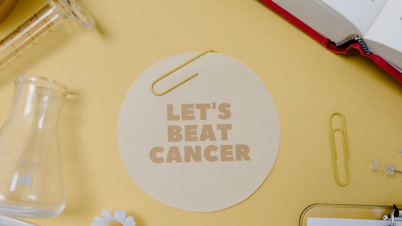Flat lay with "Let's Beat Cancer" message, encouraging medical and inspirational themes.
