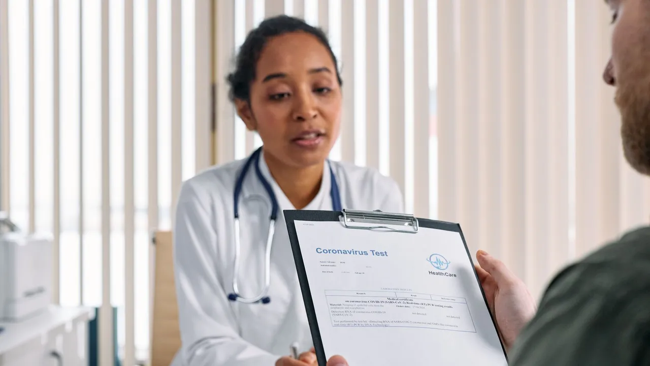 Child receiving a medical checkup in a clinic with a doctor using a stethoscope