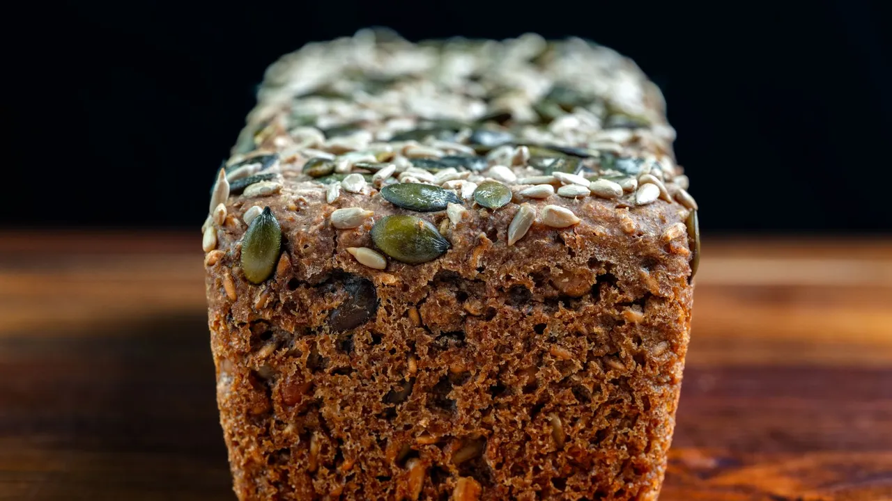 Delicious artisan multigrain loaf topped with pumpkin and sunflower seeds.