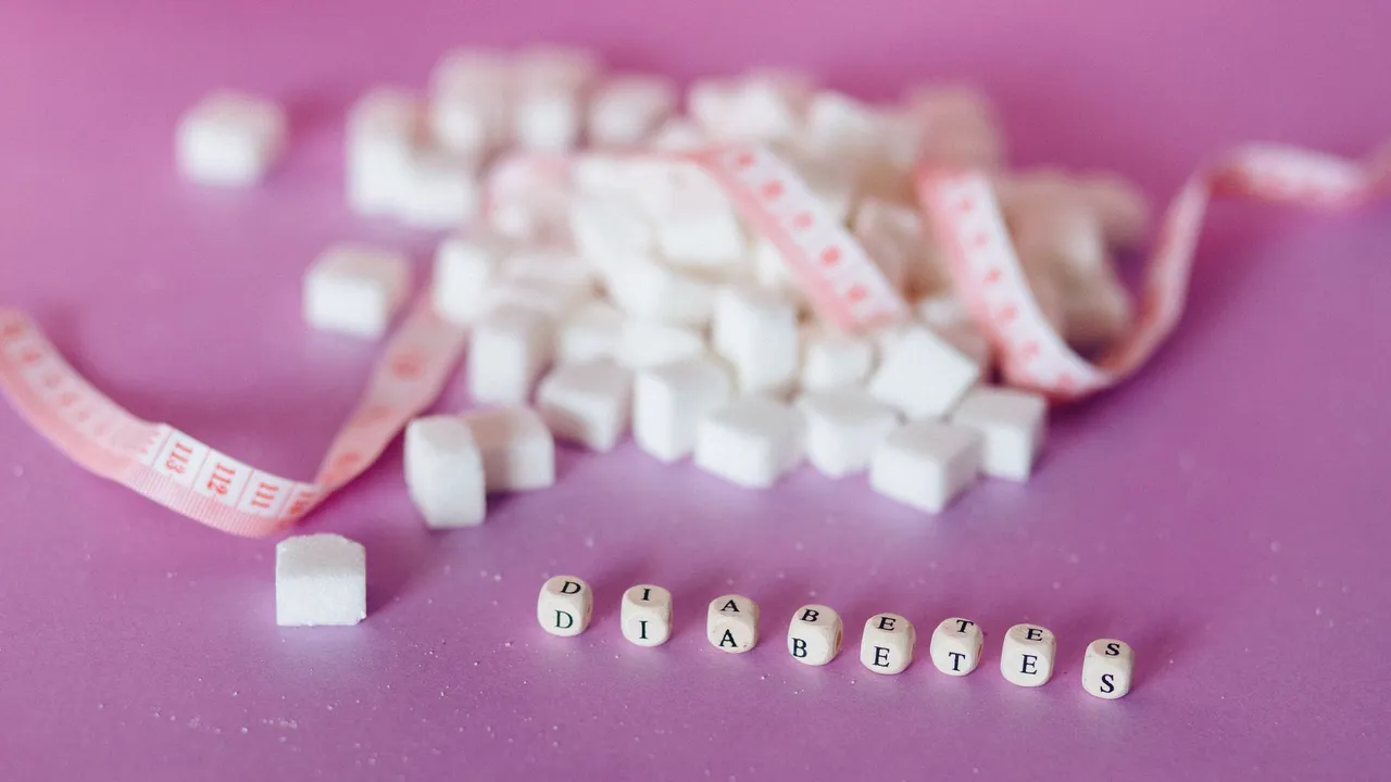 Still life of sugar cubes and diabetes concept with a tape measure, highlighting health awareness.