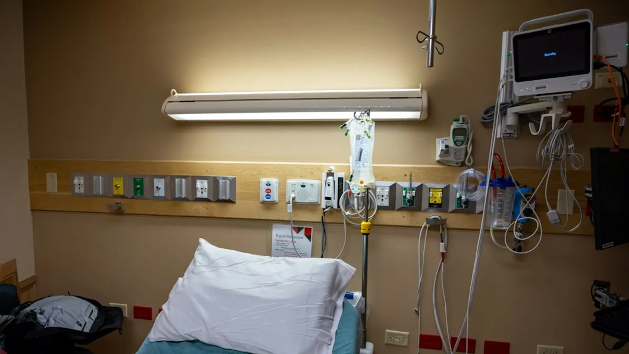 An empty hospital bed awaits a patient